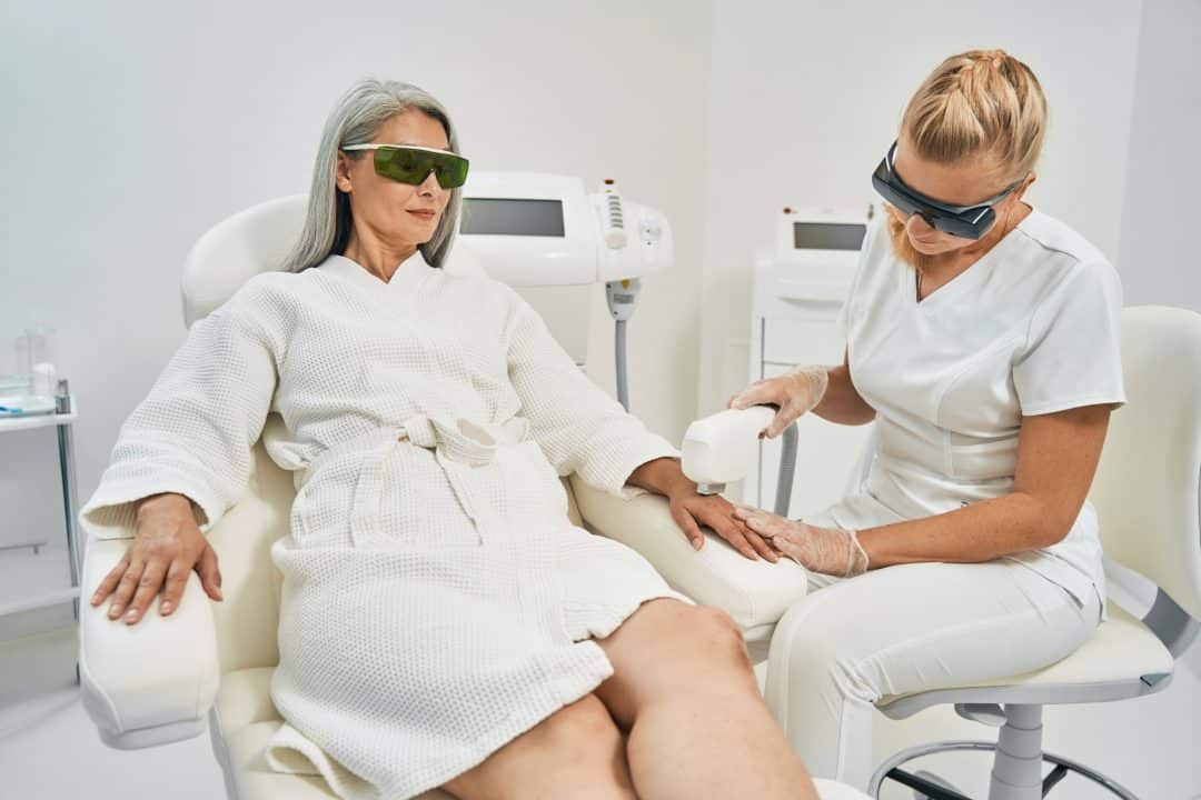 competent master wearing glasses during laser procedure 1